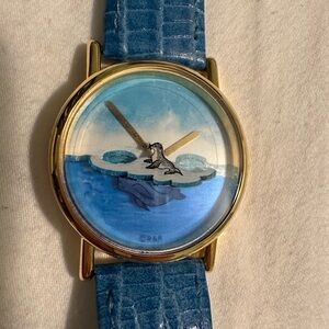 Blue Dolphin Watch with Gold Accents